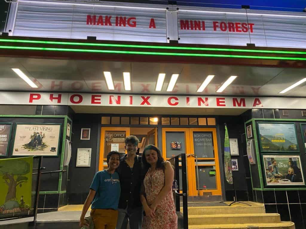 Members of the Earthwatch team pose outside the Phoenix Cinema.